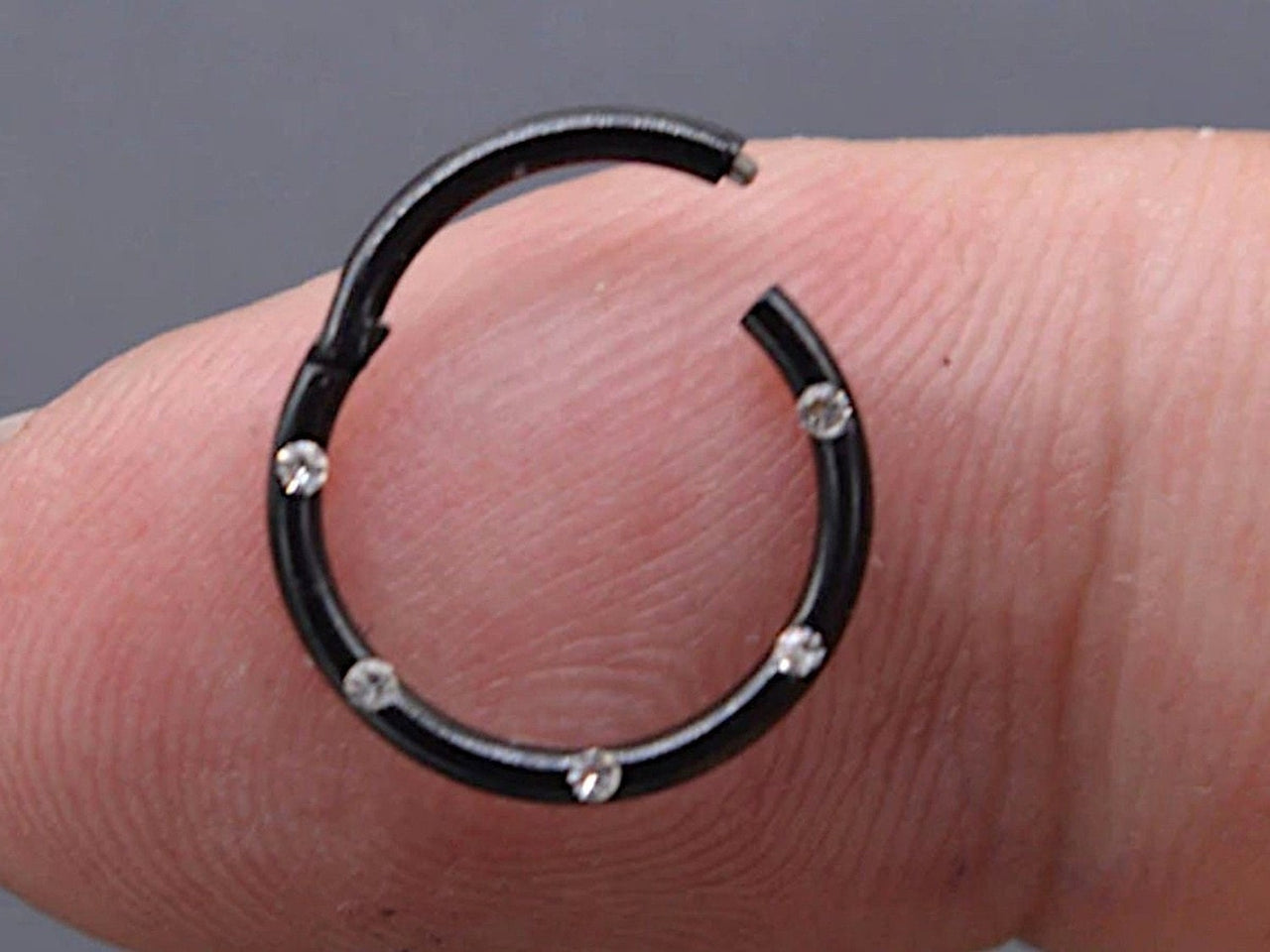 Black Hinged Hoop Ring with 5 Flush Set Petite Crystals