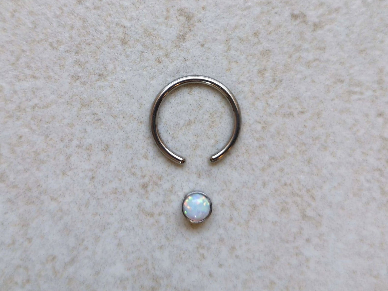 Captive Bead Ring with White Opal