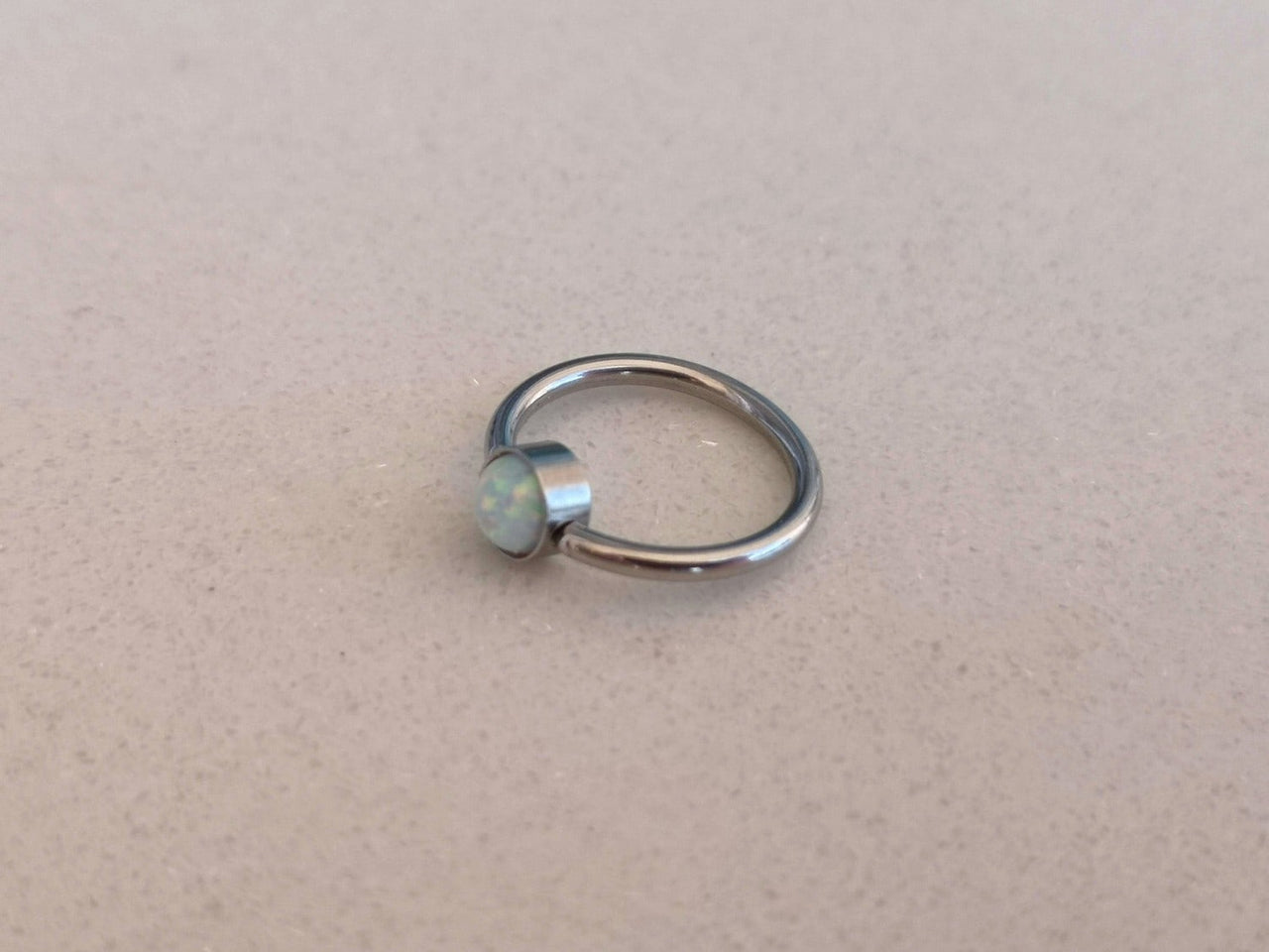 Captive Bead Ring with White Opal