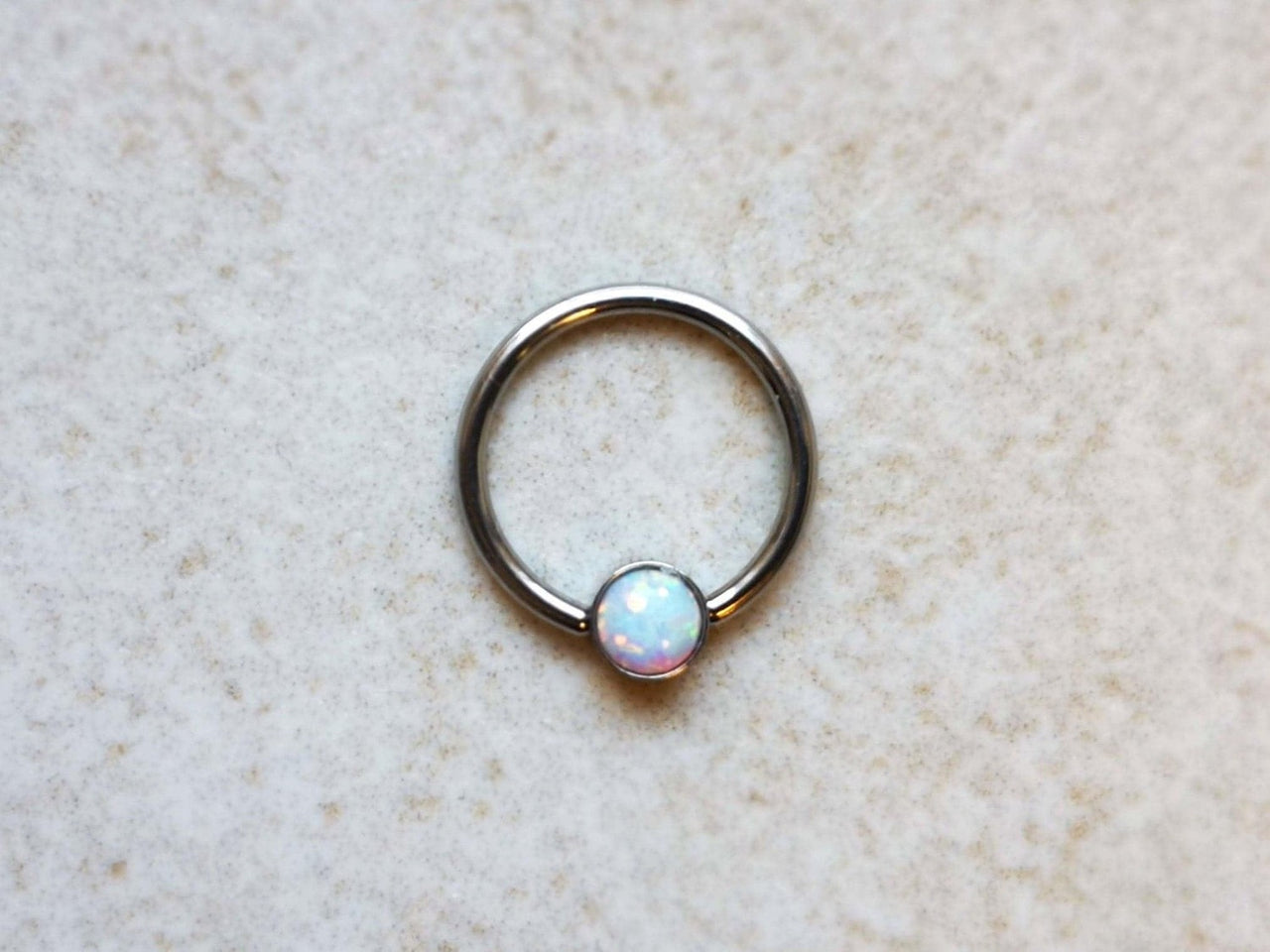 Captive Bead Ring with White Opal