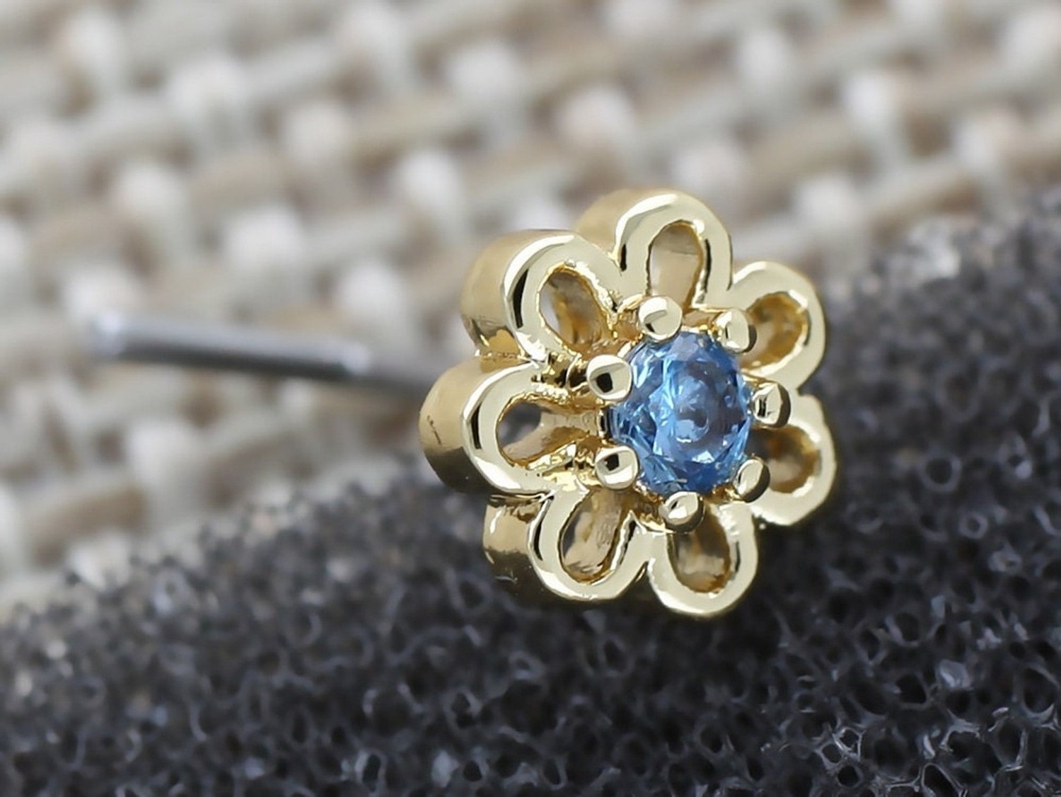 Gold Flower L Shaped Nose Stud with Central Blue Crystal