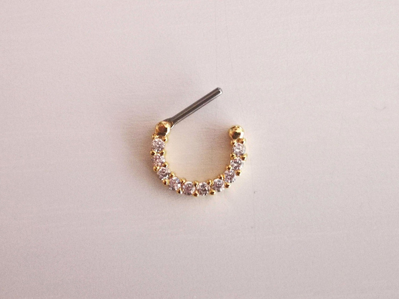 Gold Septum Clicker Ring Paved with Cubic Zirconia