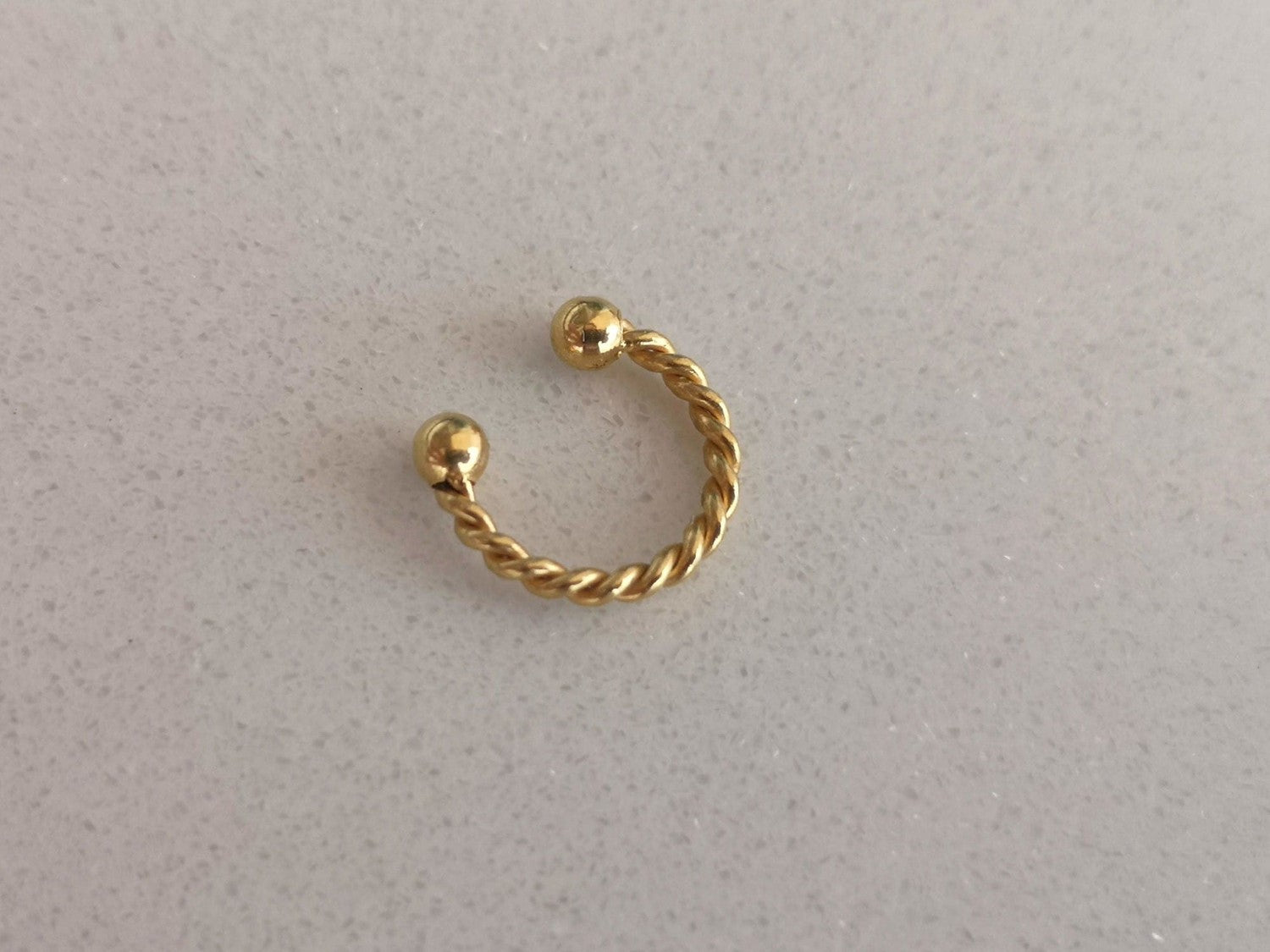 Gold Twisted Steel Faux Septum Hoop