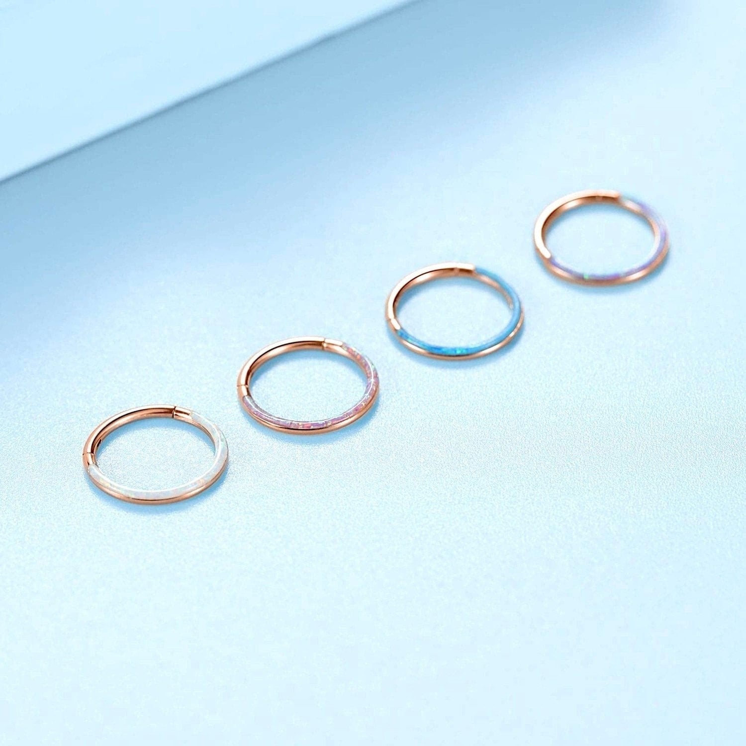 Set of 4 Rose Gold Opal Lined Hinged Septum Clicker Rings