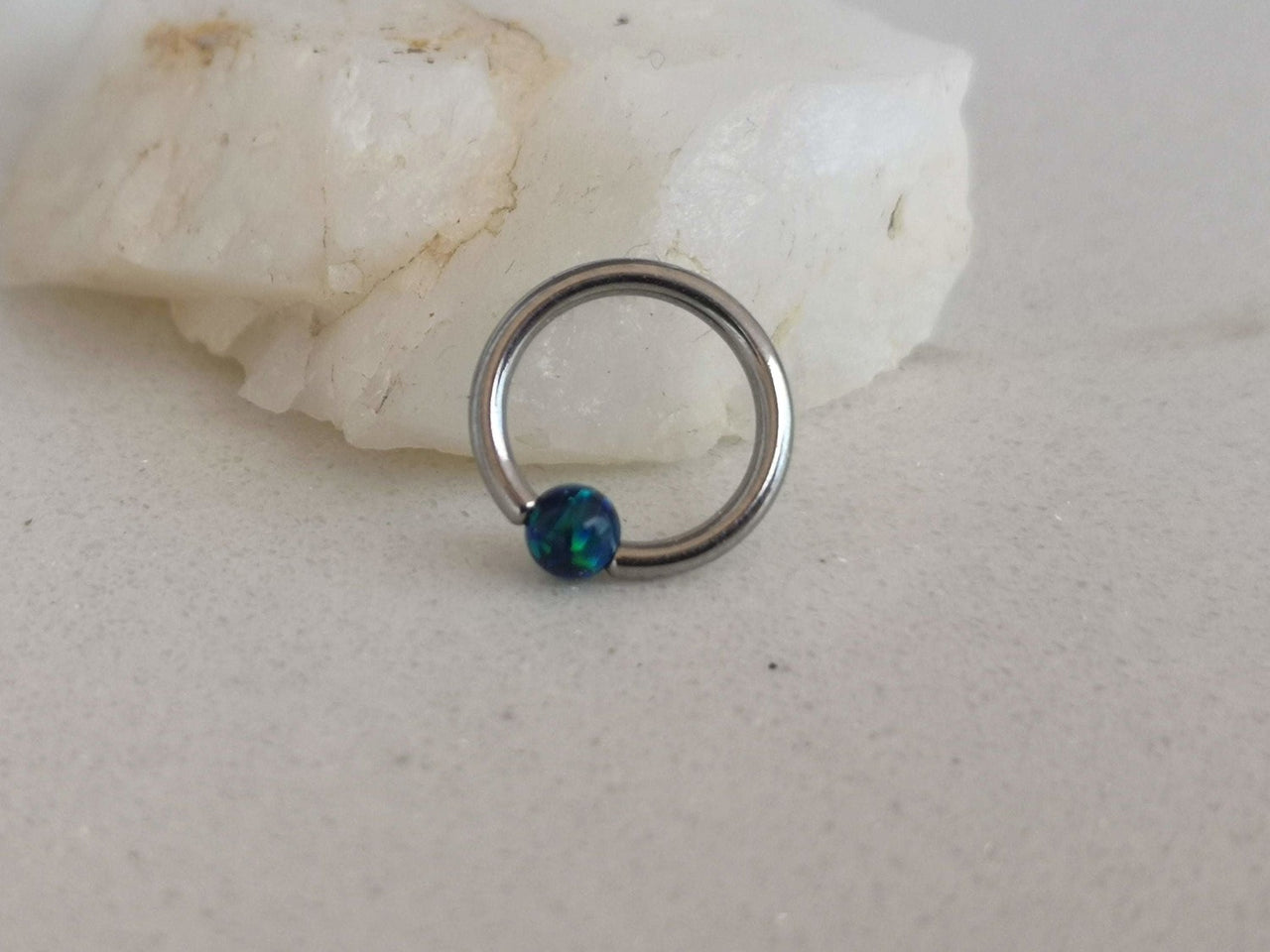 Small Captive Bead Ring with a Dark Blue Opal Ball