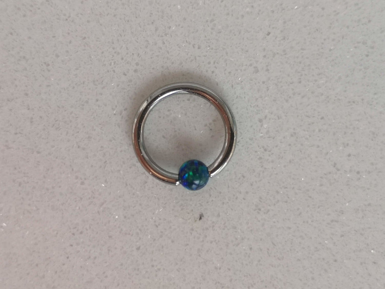 Small Captive Bead Ring with a Dark Blue Opal Ball