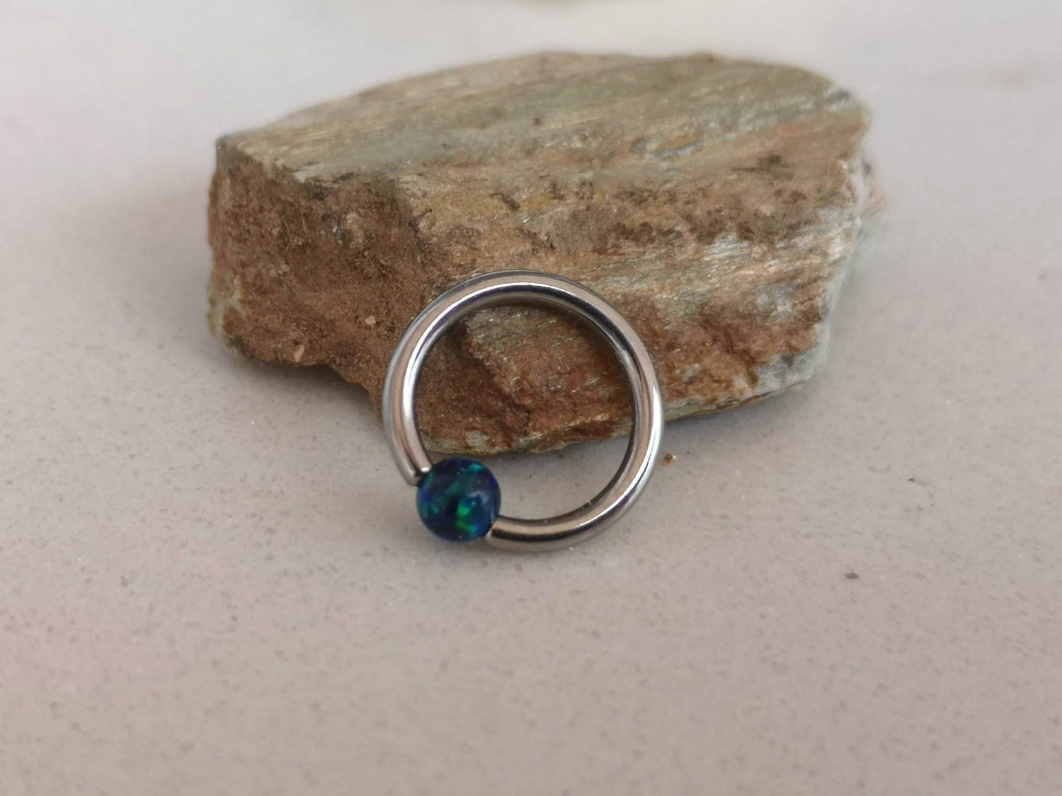 Small Captive Bead Ring with a Dark Blue Opal Ball