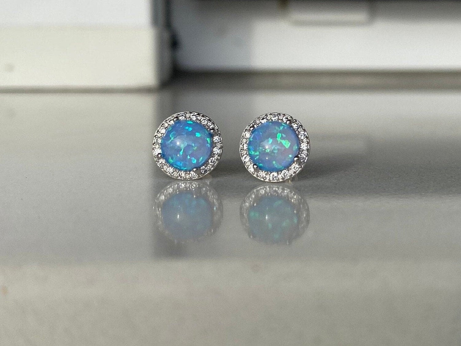 Sterling Silver Stud Earrings with Blue Opal and Crystal Halo