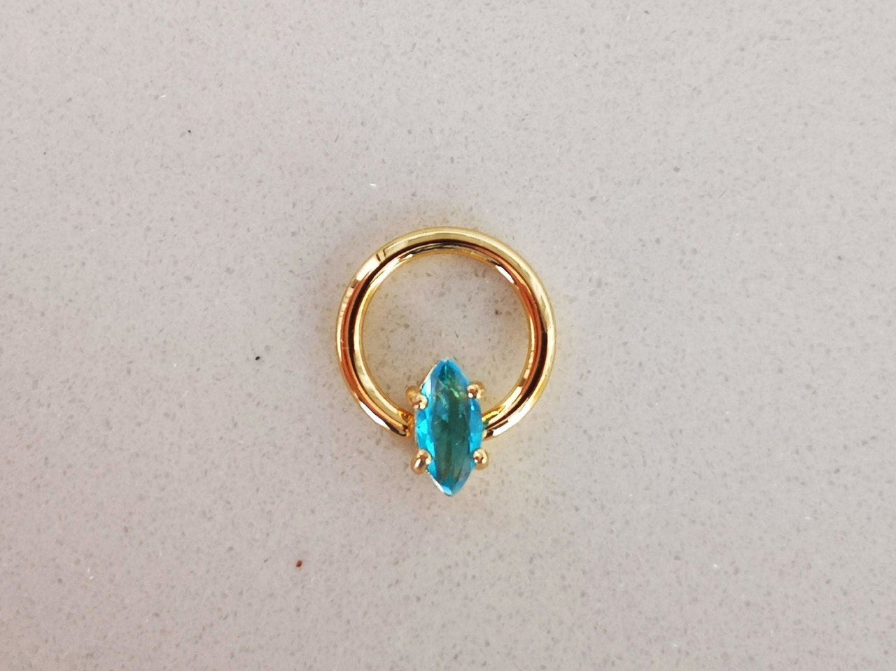 Summer Design Gold Captive Bead Ring with Blue Crystal